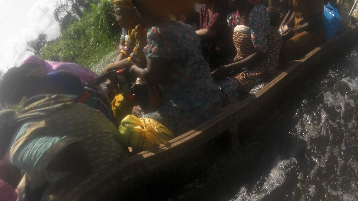 Woman remove life jacket, jumps into river from a moving both in Lagos
